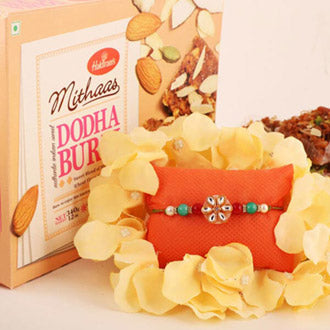 Adorned Rakhi And Dodha Burfi Combo