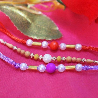 A Set Of 3 Colorful Rakhis